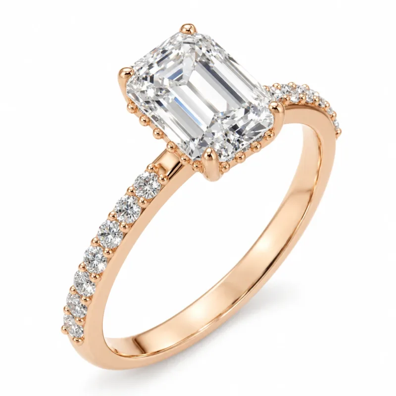 Bague halo caché Lisière émeraude en or 18 carats